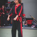 Championship Martial Arts teen student preparing to perform their form.