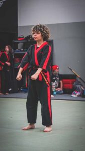 Championship Martial Arts teen student preparing to perform their form.