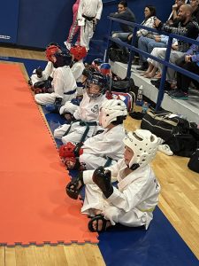 Championship Martial Arts kids getting ready for sparring.